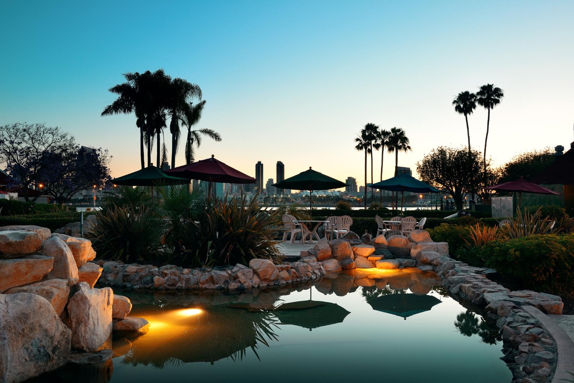 Estate grounds and water feature at dusk
